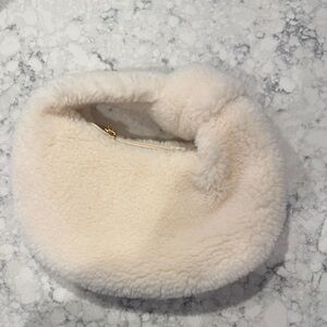 Amazon Cream Shearling Clutch